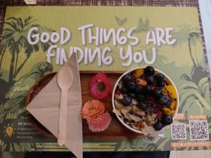 Large acai bowl with strawberries, mango, blueberries, almonds, cacao nibs and date syrup at AcaiXpress Cafe in Abu Dhabi