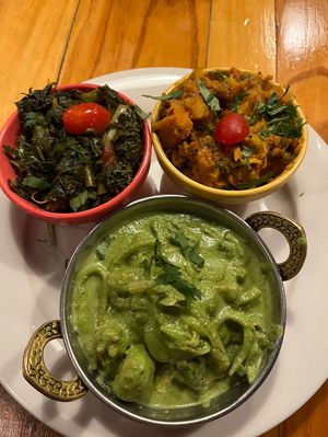 Ginger Cilantro tofu with sides of garlic kale and sweet potatoes   at Sweet 27 in Baltimore