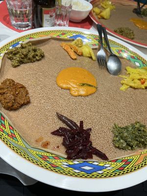 Selection of vegan curries on bread   at Sunshine Restaurant in Newcastle Upon Tyne