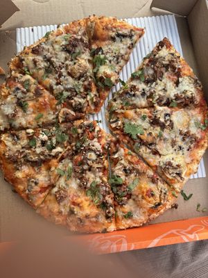 Vegan Mushrooms and Onions Pizza with dairy free cheese   at Mr Singh's Pizza in Brampton