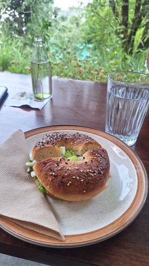 homemade bagel with cashew cream cheese at Backwoods Bakery in Dharamshala