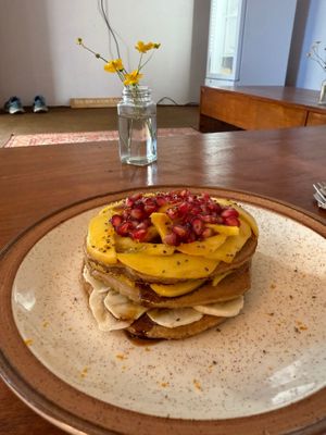 Pancakes with mango at Backwoods Bakery in Dharamshala