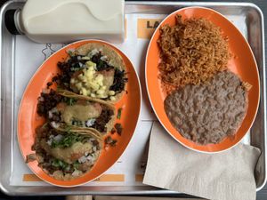Horchata (in top-right corner) and taco platter (includes 3 tacos of your choice with rice and beans)  at La Venganza in San Francisco