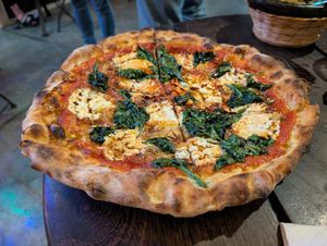 Delicious spinach pizza at Cafe Zorba in Medellin