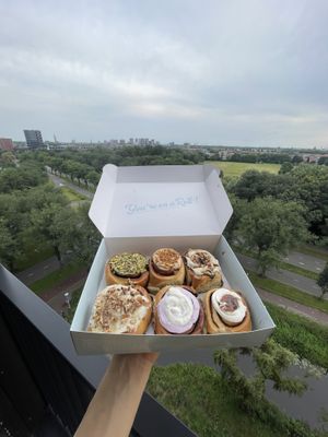 Top row: pistachio roll, Speculoos roll, pecan-caramel roll. Bottom row: Pecan-caramel roll, lime lavender roll, orange blossom-fig roll  at Have a Roll in Utrecht