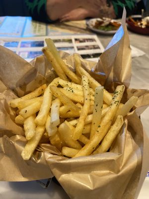 Truffle fries with no cheese powder. Truffle oil generous but not overpowering, standard truffle fries.   at Devil's Door in Seoul