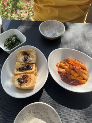 Banchan - Garlic Spinach, Tofu & Tteokbokki  at Seoul Food in Windhoek