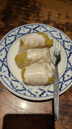 Poached banana with coconut sauce at Ban Khun Mae in Bangkok