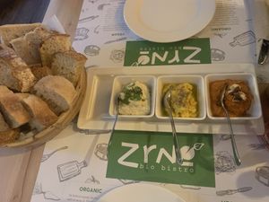Three spreads w/homemade bread  at Zrno Bio Bistro in Zagreb