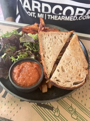 Seitan sandwich with sweet potato fries  at Zrno Bio Bistro in Zagreb