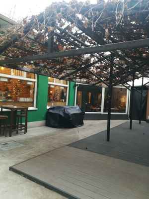Restaurant is located a little bit hidden in the yard at Zrno Bio Bistro in Zagreb