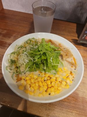 Green onions, corns ans bamboo shots (what I asked) and few additional greens. Egg possible if you vegetarian. Taste is good. at Menya Shirakawa Bettei in Gifu