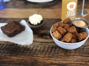 Tater tots, cupcake, brownie at Lulu's Local Eatery in St Louis