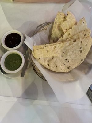 Papadam with mint leaf and tamarind sauce  at Taj of India Cuisine in Washington