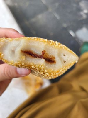 The inside of the sesameball is like a mochi and its filled with a redbeanpaste. Not too sweet, very delicious even it was oily on the outside at Chenji Bakery (Zhejiang Middle Road Store) - 陈记饼店(浙江中路店) in Shanghai