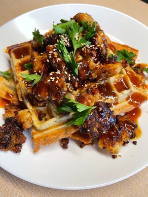 Savory waffle with scratch-made vege meat and sweet and sour sauce. at Our Sunny Workshop in Kyoto