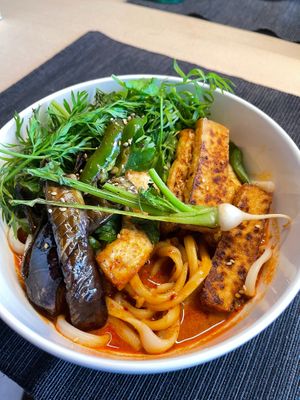 Peanut broth noodles with tempe. at Our Sunny Workshop in Kyoto