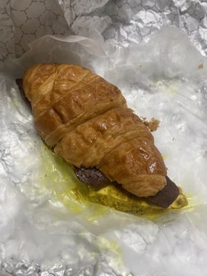 Croissant breakfast sandwich  at Liberation Kitchen in Chicago