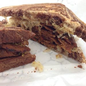Pastrami Sandwich: Our Pastrami Seitan with spicy mustard and 
sauerkraut on marble rye. at Liberation Kitchen in Chicago