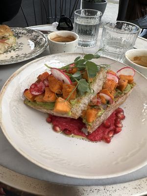 Avocado toast with beetroot hummus - I ordered minus the feta   at Charlie's - Avram Iancu in Sibiu