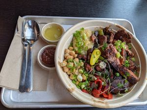 Bowl with lion's mane mushrooms at Kayma Algerian Eatery in San Francisco