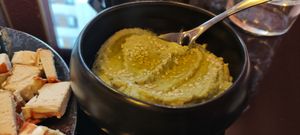 Artichoke spread, white beans, preserved lemon, basil. at Speechless in Paris