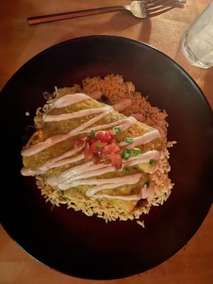Vegan enchiladas with sweet potato and black beans, topped with a veg creama. Delicious!  at Alto Cinco in Syracuse