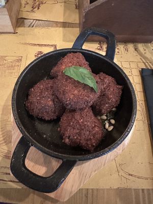 Vegan chickpea balls (labeled Vegane on menu)  at Taverna 51 in Rome
