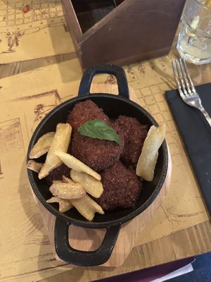 Added French fries (super fun crispy texture, hollow in middle)  at Taverna 51 in Rome
