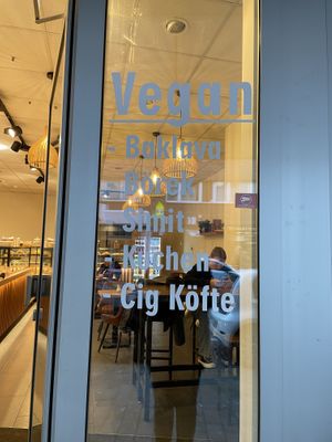 Shop front with vegan options   at Taqsim Patisserie in Cologne