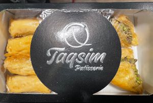 Box with logo  at Taqsim Patisserie in Cologne
