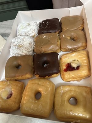 Glazed, Maple (filled + not filled), Custard filled, Powedered lemon, Lemon Raspberry, Chocolate frosted   at Donut Land in Tualatin
