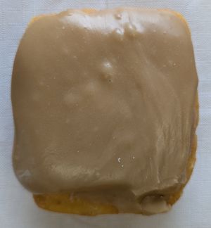 Vegan Cream Filled w/ Maple Icing at Donut Land in Tualatin