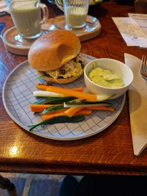 Burger with scrambled eggs at Piccola Cafe in Ljubljana