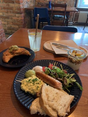 bigg a** breakfast and a filled pistacchio croissant  at Piccola Cafe in Ljubljana