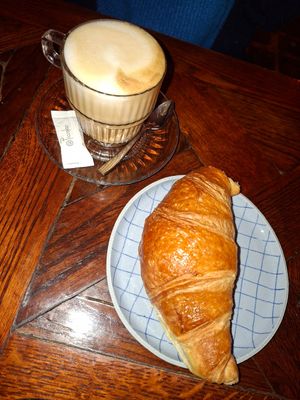 Croissant and coffee at Piccola Cafe in Ljubljana