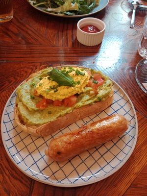 Avocado toast with "egg + sausage" as an extra 😋 at Piccola Cafe in Ljubljana