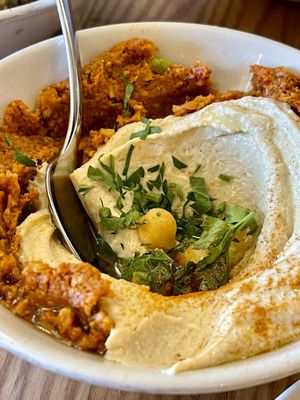 Hommos on a bed of muhammara  at Ruba Restaurant in Teddington