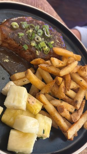 Jerk chkn with spiced fries and pineapple   at Turtle Bay in Salford