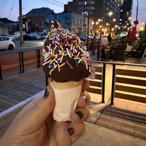 Mini Vegan Dipped Cone with Dark Belgian Chocolate and Sprinkles!   at La Creme de la Creme Creamery Inc in Burlington