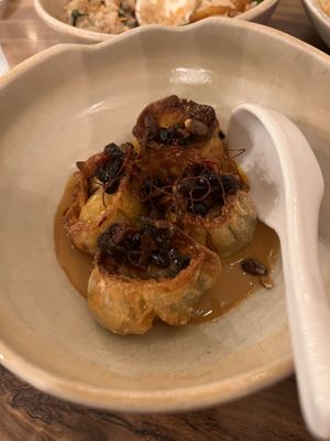 Sweet Potato & Sesame Gyoza | Black bean vinaigrette   at Honeysuckle Restaurant  in Buderim