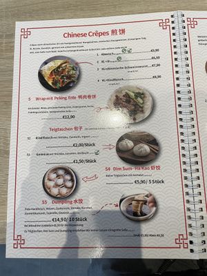 neue speisekarte mit gekennzeichneten veganen UND vegetarischen optionen! 🌱  at Wang Chinese Crêpes + Burgers in Bremen