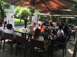Sitting outside in the garden at Bingsheng Zen Tea House in Guangzhou