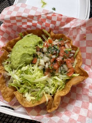 It has refried beans, mushrooms , bell peppers and potato at the bottomm  at Giliberto's Mexican Taco Shop in Moab