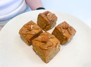 The rich, slightly bitter taste of organic coffee and the toasty aroma of almonds are perfectly accented by a sweet coffee glaze. at iro scone in Yokohama