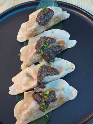 Mushroom with black truffle gyoza at The Vegan Roll in Madrid