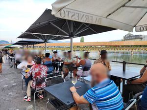 Riverside seating at Bierliebe & Friends in Luzern