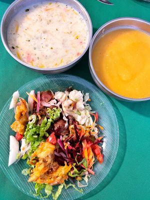 Sopa de mani, pumpkin soup, salad plate  at Raul in Cochabamba
