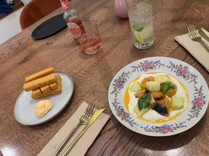 chickpea sticks and grilled peaches as starters. Don‘t have any photos of the lion’s mane steaks cause they looked so yummy we had to eat them immediately ;) at Barbarella PLANT Bistro in Ljubljana