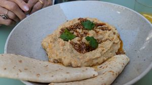 Delicious hummus -- whole chickpeas inside at Barbarella PLANT Bistro in Ljubljana